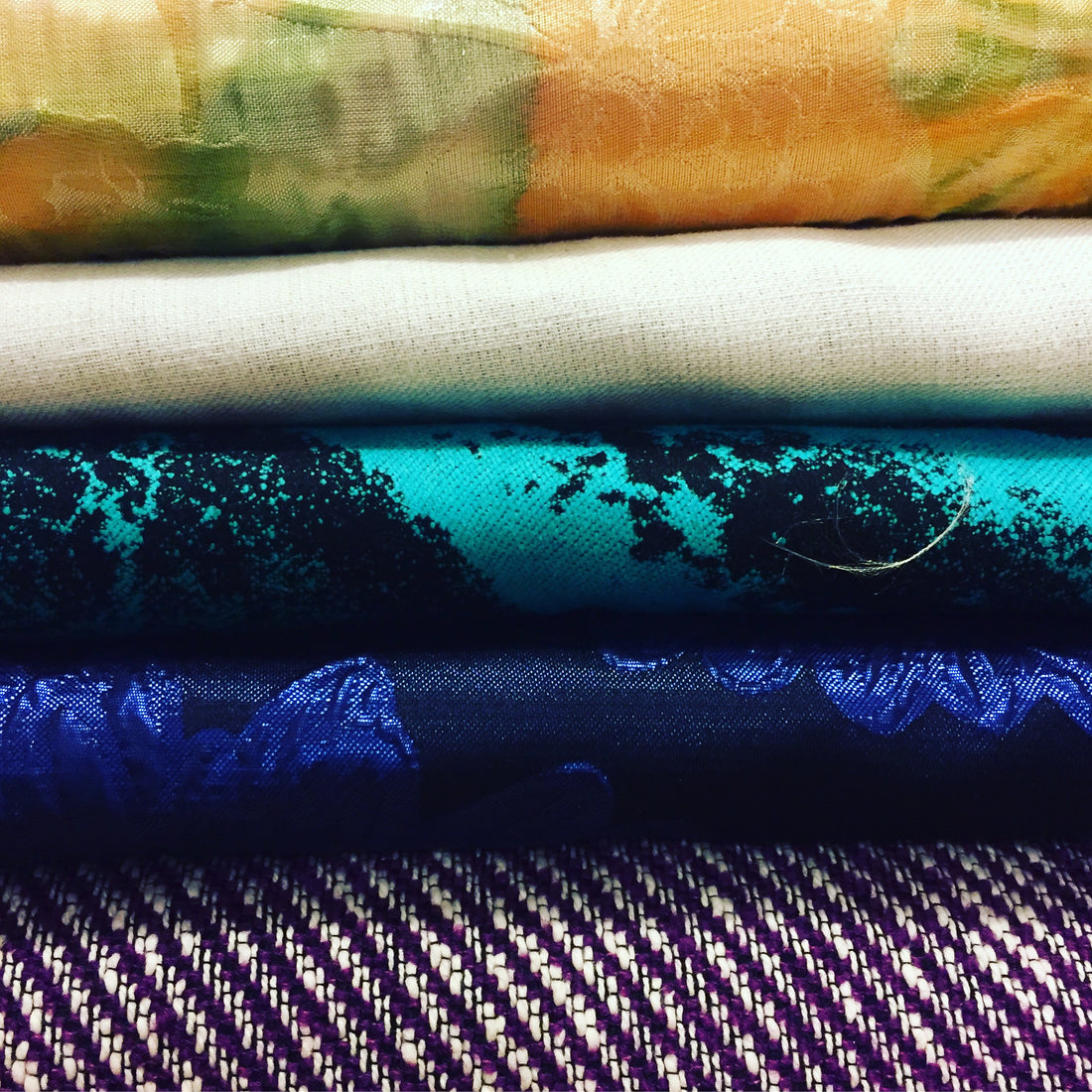 different fabrics stacked on top of each other